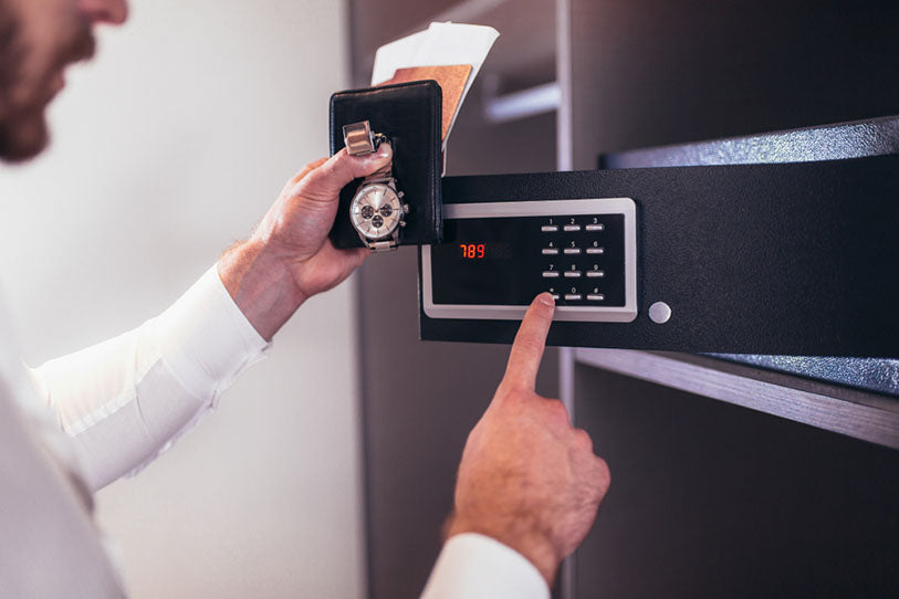 man opening home safe